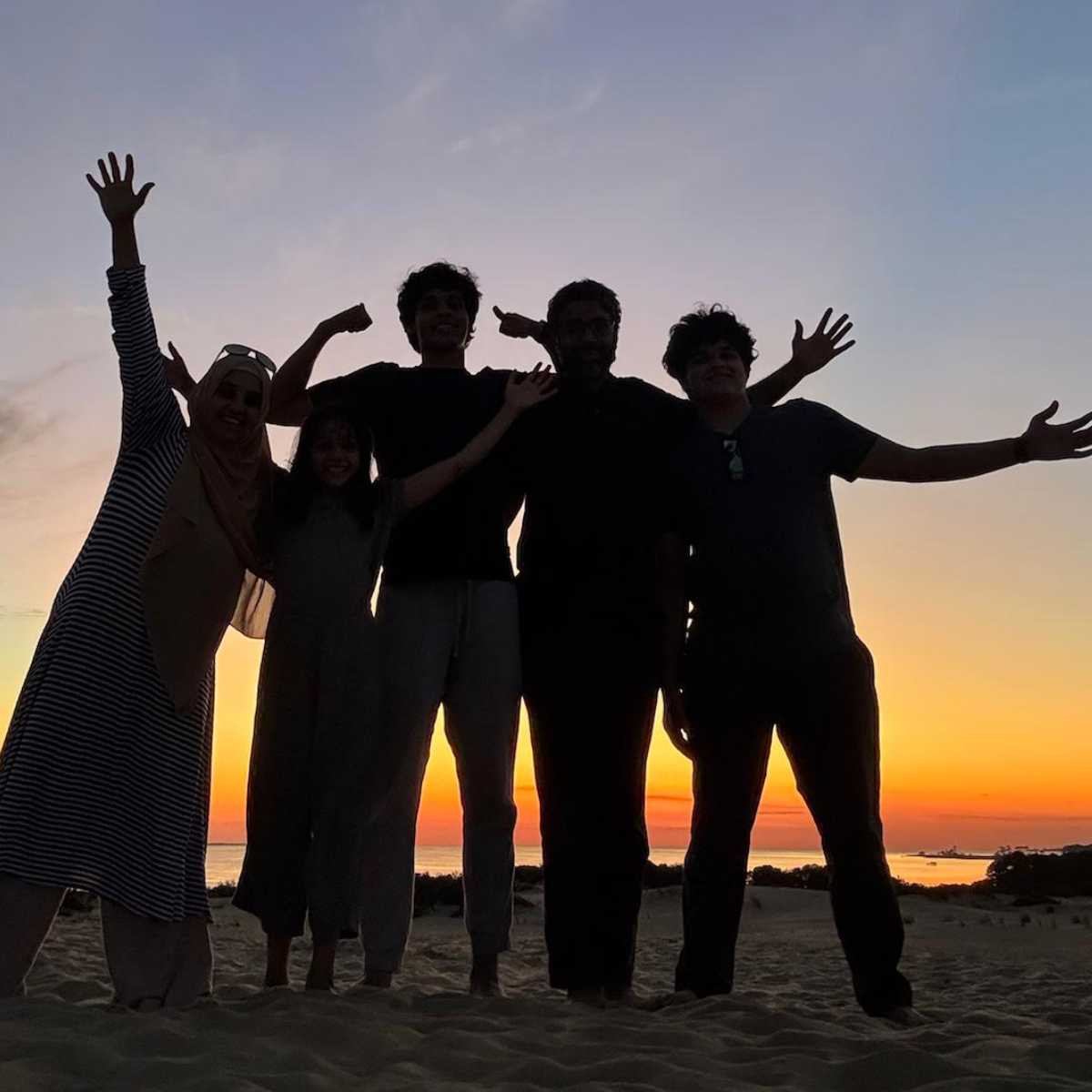 Nasir and Zahra with their family at Jockey's Ridge State Park in North Carolina